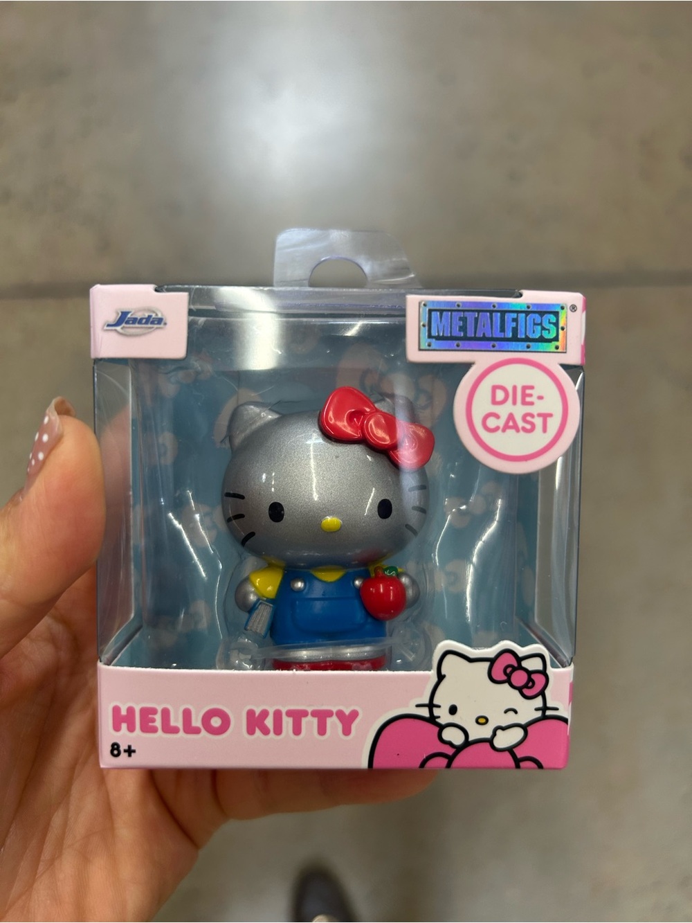 Hello Kitty Die-Cast Figure in Silver, Red, Blue and Yellow